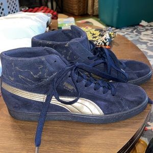 Barely used Puma blue suede with gold accent and design mid size 10